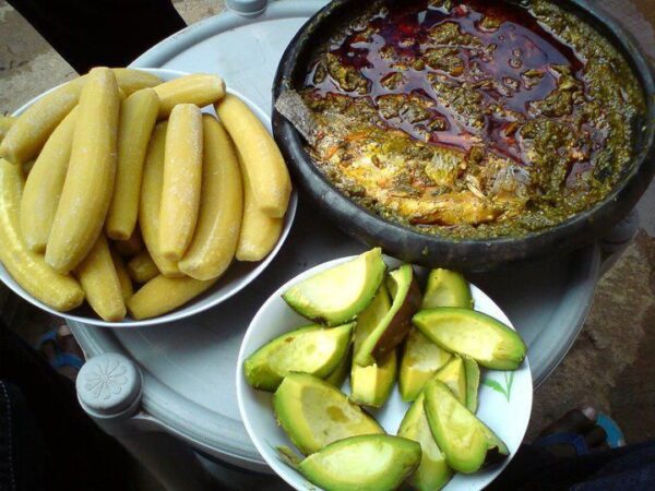 Ampesi with abom and egg, salmon, koobi, avocado